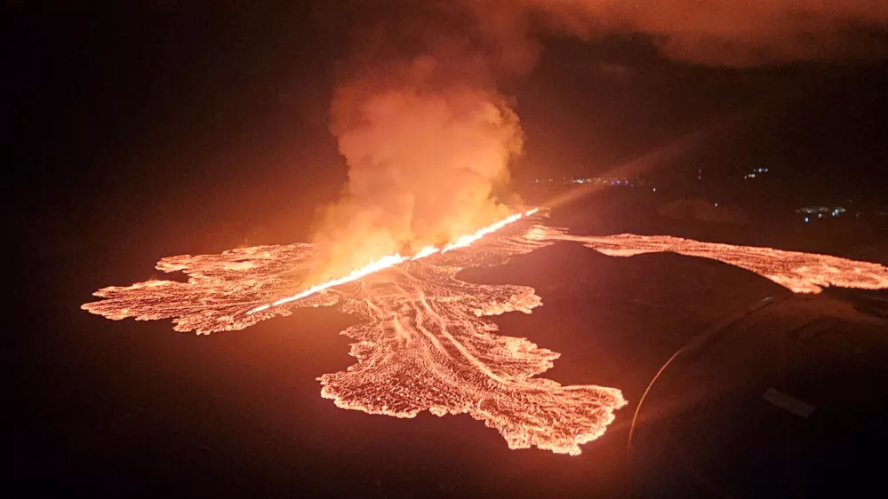 Lava spurts and flows after the eruption of a volcano in the Reykjanes Peninsula near Grindavik, Iceland, in this handout picture released on November 21, 2024. Civil Protection of Iceland/Handout via REUTERS  THIS IMAGE HAS BEEN SUPPLIED BY A THIRD PARTY. NO RESALES. NO ARCHIVES. MANDATORY CREDIT.