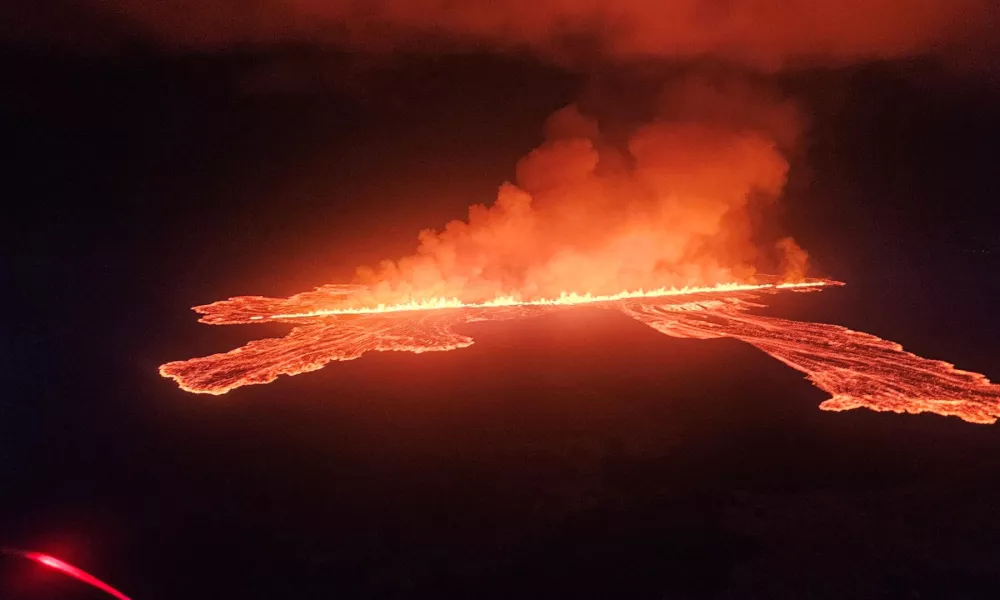 Lava spurts and flows after the eruption of a volcano in the Reykjanes Peninsula near Grindavik, Iceland, in this handout picture released on November 21, 2024. Civil Protection of Iceland/Handout via REUTERS  THIS IMAGE HAS BEEN SUPPLIED BY A THIRD PARTY. NO RESALES. NO ARCHIVES. MANDATORY CREDIT.