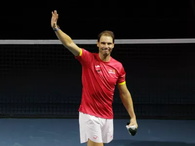 Tennis - Davis Cup Finals - Quarter Final - Netherlands v Spain - Palacio de Deportes Jose Maria Martin Carpena Arena, Malaga, Spain - November 20, 2024 Spain's Rafael Nadal waves at fans during a tribute to his career after The Netherlands eliminated Spain REUTERS/Jon Nazca