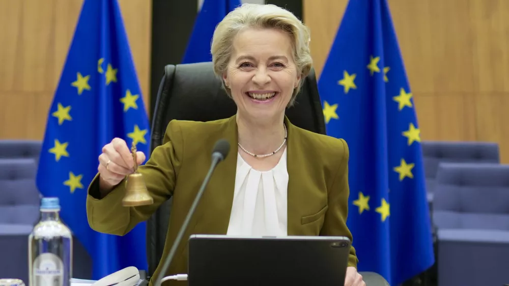 European Commission President Ursula von der Leyen rings a bell to signify the beginning of the weekly college of commissioners meeting at EU headquarters in Brussels on Wednesday, Oct. 30, 2024. (AP Photo/Virginia Mayo)