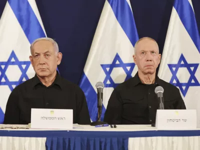 FILE - Israeli Prime Minister Benjamin Netanyahu, left, and Defense Minister Yoav Gallant attend a press conference in the Kirya military base in Tel Aviv, Israel, Saturday, Oct. 28, 2023. (Abir Sultan/Pool Photo via AP, File)