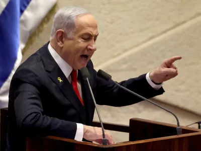 Israeli Prime Minister Benjamin Netanyahu speaks at the plenum, during a discussion on the subject of hostages kidnapped during the deadly October 7, 2023 attack, in Israel's parliament, the Knesset, in Jerusalem, November 18, 2024. REUTERS/Ronen Zvulun/