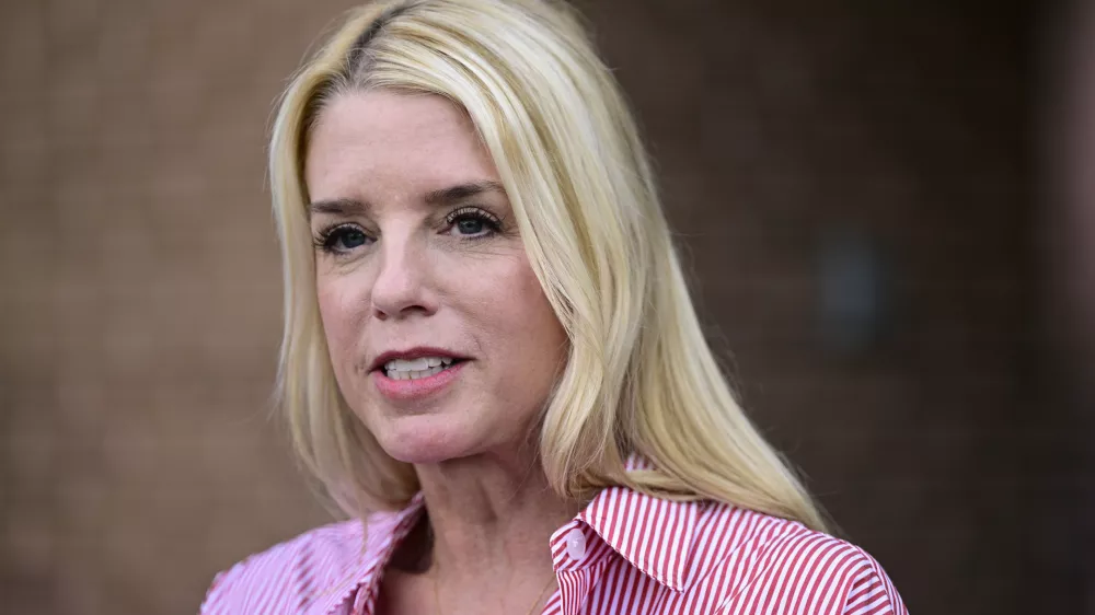 FILE - Pam Bondi, former Florida Attorney General, speaks to reporters outside an election integrity volunteer training, June 18, 2024, in Newtown, Pa. (AP Photo/Derik Hamilton, File)