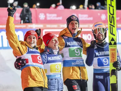 Germany's Selina Freitag, Katharina Schmid, Andreas Wellinger and Pius Paschke after the mixed team competition during the FIS Ski Jumping World Cup Mixed Large Hill Team in the Lysgardsbakken in Lillehammer, Norway, Friday Nov. 22, 2024. (Geir Olsen/NTB via AP)