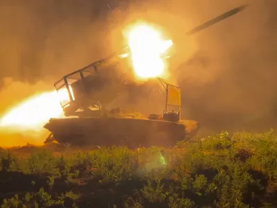 In this photo taken from a video released by Russian Defense Ministry press service on Wednesday, Nov. 13, 2024, the Russian army's multiple rocket launcher Solntsepyok fires towards Ukrainian positions in the border area of Kursk region, Russia. (Russian Defense Ministry Press Service via AP)