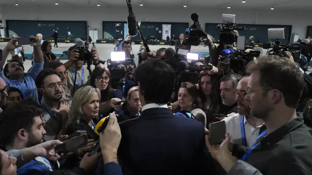 Wopke Hoekstra, EU climate commissioner, speaks to members of the media at the COP29 U.N. Climate Summit, Sunday, Nov. 24, 2024, in Baku, Azerbaijan. (AP Photo/Joshua A. Bickel)