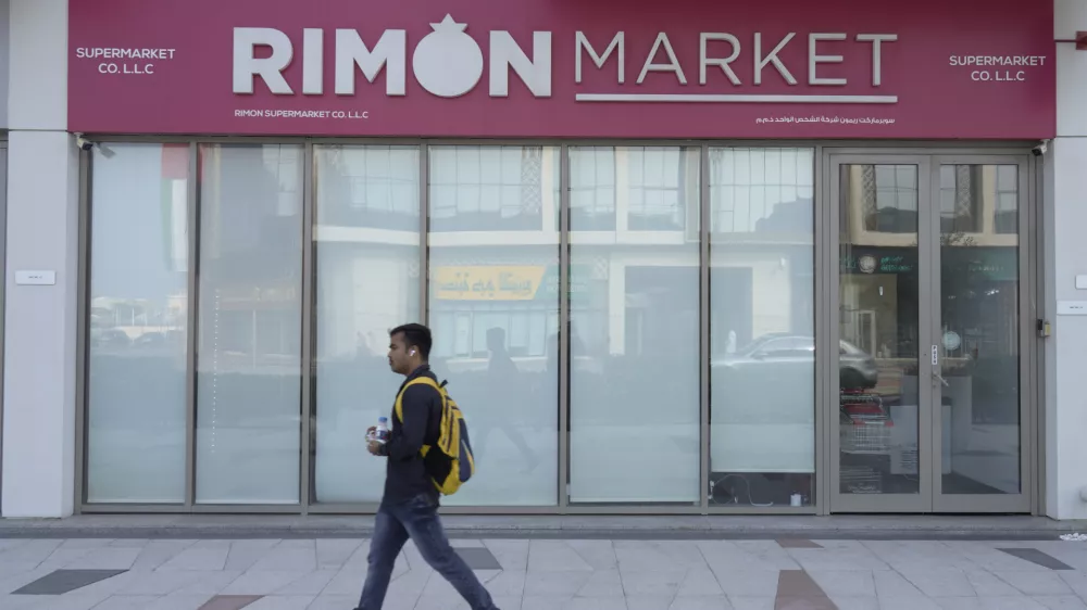 A man walks past Rimon Market, a Kosher grocery store managed by the late Rabbi Zvi Kogan, in Dubai, United Arab Emirates, Sunday, Nov. 24, 2024. (AP Photo/Jon Gambrell)