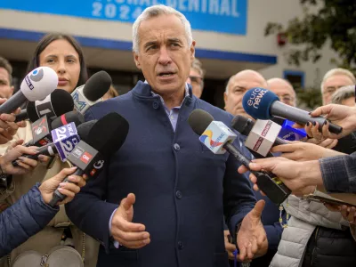 Calin Georgescu, running as an independent candidate for president, speaks to media after registering his bid in the country's presidential elections, in Bucharest, Romania, Tuesday, Oct. 1, 2024. (AP Photo/Alexandru Dobre)