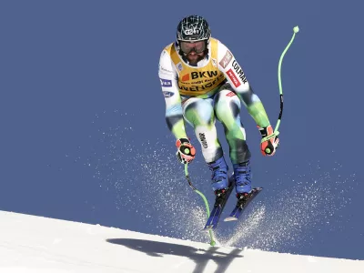 ﻿Slovenia's Bostjan Kline speeds down the course during an alpine ski, men's World Cup downhill race, in Wengen, Switzerland, Friday, Jan. 14, 2022. (AP Photo/Gabriele Facciotti)