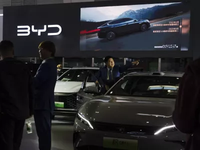 Chinese automaker BYD displays its vehicles at the China International Supply Chain Expo in Beijing, Wednesday, Nov. 27, 2024. (AP Photo/Ng Han Guan)