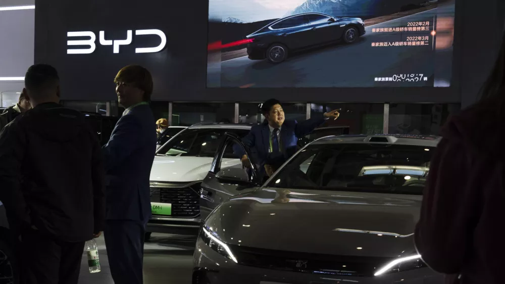 Chinese automaker BYD displays its vehicles at the China International Supply Chain Expo in Beijing, Wednesday, Nov. 27, 2024. (AP Photo/Ng Han Guan)