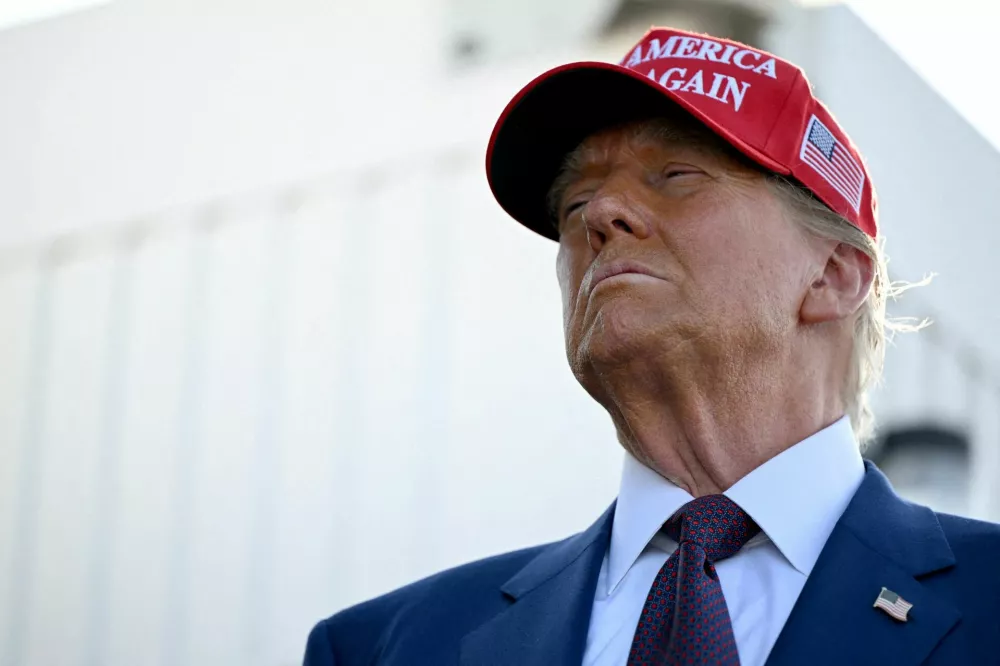 FILE PHOTO: U.S. President-elect Donald Trump attends a viewing of the launch of the sixth test flight of the SpaceX Starship rocket, in Brownsville, Texas, U.S., November 19, 2024. Brandon Bell/Pool via REUTERS/File Photo / Foto: Brandon Bell