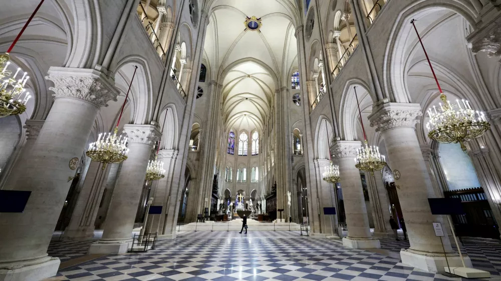 A view of the nave of Notre-Dame de Paris Cathedral in Paris, on November 29, 2024. The Notre-Dame Cathedral is set to re-open early December 2024, with a planned weekend of ceremonies on December 7 and 8, 2024, five years after the 2019 fire which ravaged the world heritage landmark and toppled its spire. Some 250 companies and hundreds of experts were mobilised for the five-year restoration costing hundreds of millions of euros.   STEPHANE DE SAKUTIN/Pool via REUTERS