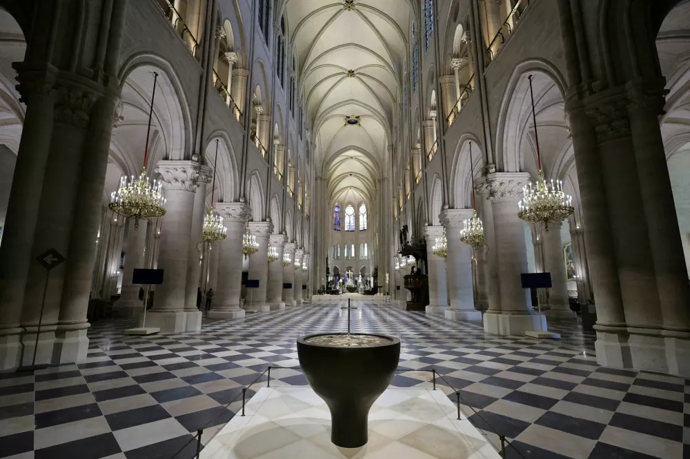 A general view of Notre-Dame de Paris cathedral during a visit by French President Macron, in Paris, France, 29 November 2024. French President Macron is visiting the cathedral's construction site on 29 November, to thank the donors and people who worked to rebuild the monument after it was severely damaged in a fire that broke out on 15 April 2019. The Paris Cathedral will be officially inaugurated after nearly six years of renovation work on 07 December 2024. CHRISTOPHE PETIT TESSON/Pool via REUTERS