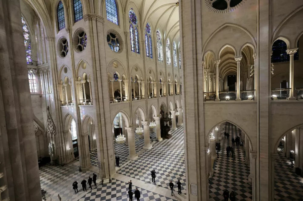 A general view of Notre-Dame de Paris cathedral during a visit by French President Macron, in Paris, France, 29 November 2024. French President Macron is visiting the cathedral's construction site on 29 November, to thank the donors and people who worked to rebuild the monument after it was severely damaged in a fire that broke out on 15 April 2019. The Paris Cathedral will be officially inaugurated after nearly six years of renovation work on 07 December 2024. CHRISTOPHE PETIT TESSON/Pool via REUTERS