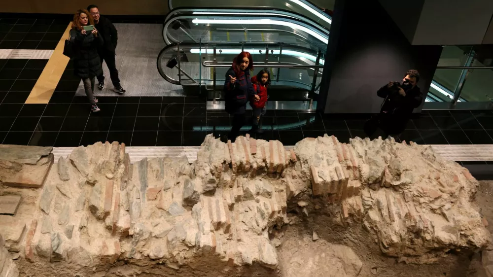 People view antiquities at Venizelou metro station on the first day of Thessaloniki's metro commercial use in Thessaloniki, Greece, November 30, 2024. REUTERS/Alexandros Avramidis