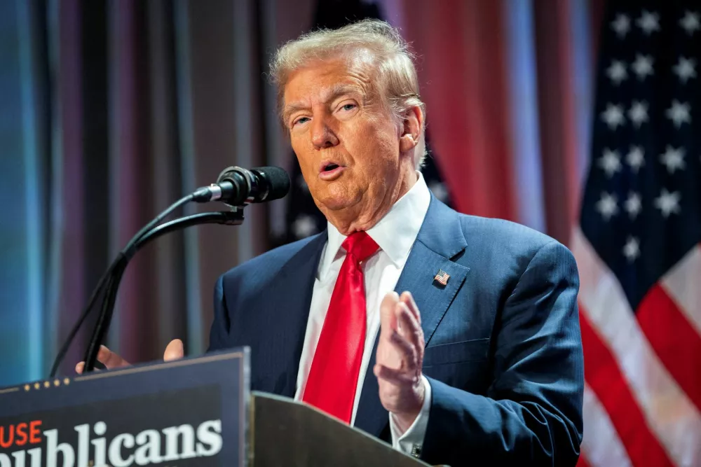 FILE PHOTO: US President-elect Donald Trump speaks during a meeting with House Republicans at the Hyatt Regency hotel in Washington, DC, U.S. on November 13, 2024.   ALLISON ROBBERT/Pool via REUTERS/File Photo