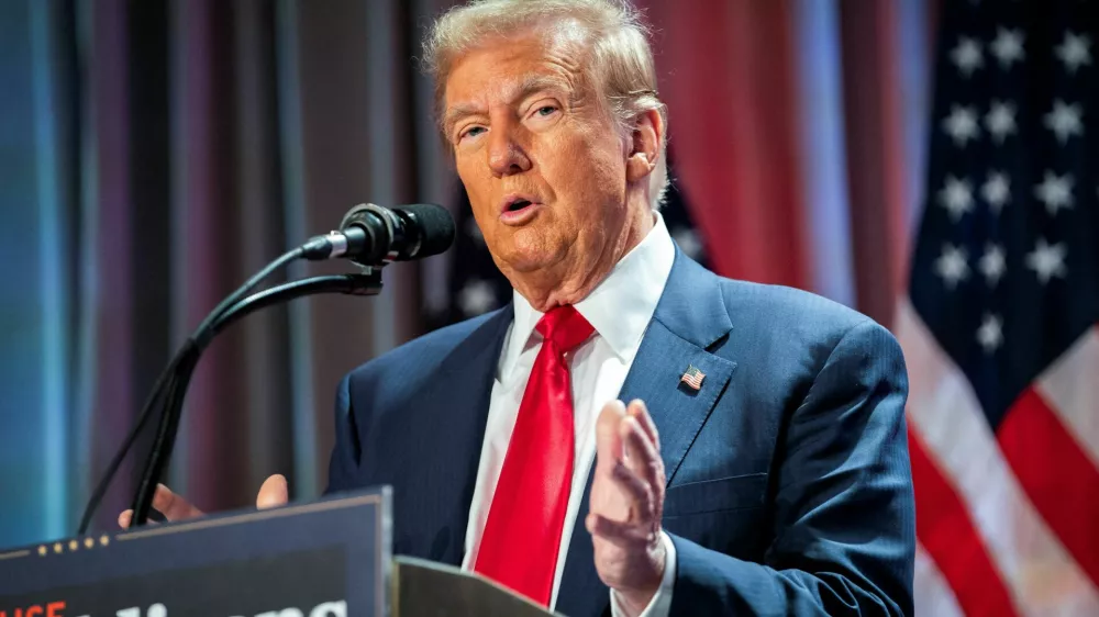 FILE PHOTO: US President-elect Donald Trump speaks during a meeting with House Republicans at the Hyatt Regency hotel in Washington, DC, U.S. on November 13, 2024.   ALLISON ROBBERT/Pool via REUTERS/File Photo