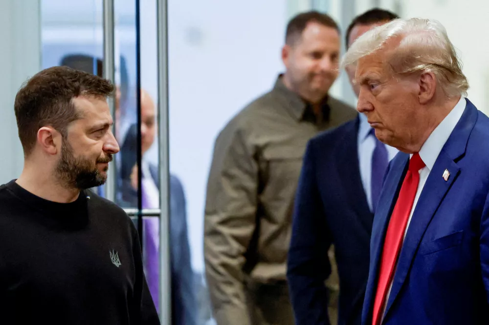 FILE PHOTO: Republican presidential nominee and former U.S. President Donald Trump and Ukraine's President Volodymyr Zelenskiy meet at Trump Tower in New York City, U.S., September 27, 2024. REUTERS/Shannon Stapleton/File Photo