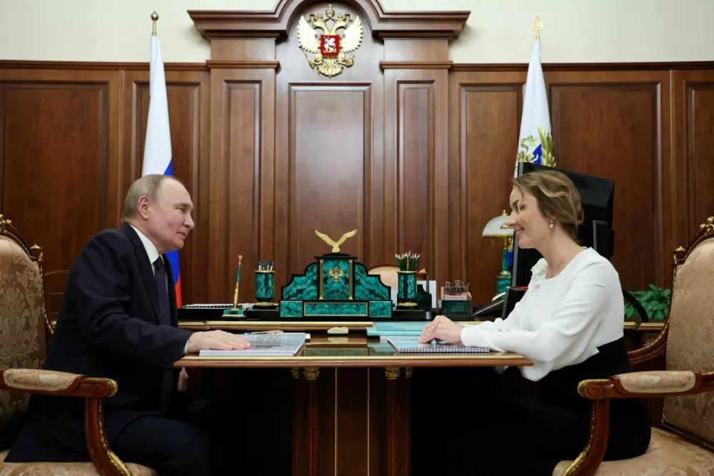 FILE PHOTO: Russian President Vladimir Putin meets with Presidential Commissioner for Children's Rights Maria Lvova-Belova in Moscow, Russia May 31, 2024. Sputnik/Alexander Kazakov/Pool via REUTERS ATTENTION EDITORS - THIS IMAGE WAS PROVIDED BY A THIRD PARTY./File Photo