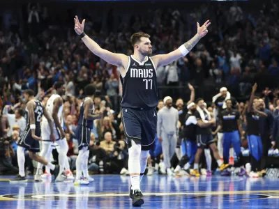 Dec 3, 2024; Dallas, Texas, USA; Dallas Mavericks guard Luka Doncic (77) reacts during the fourth quarter against the Memphis Grizzlies at American Airlines Center. Mandatory Credit: Kevin Jairaj-Imagn Images