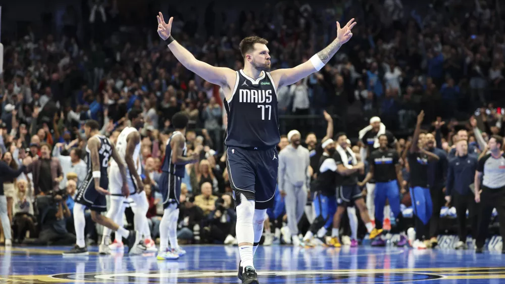 Dec 3, 2024; Dallas, Texas, USA; Dallas Mavericks guard Luka Doncic (77) reacts during the fourth quarter against the Memphis Grizzlies at American Airlines Center. Mandatory Credit: Kevin Jairaj-Imagn Images