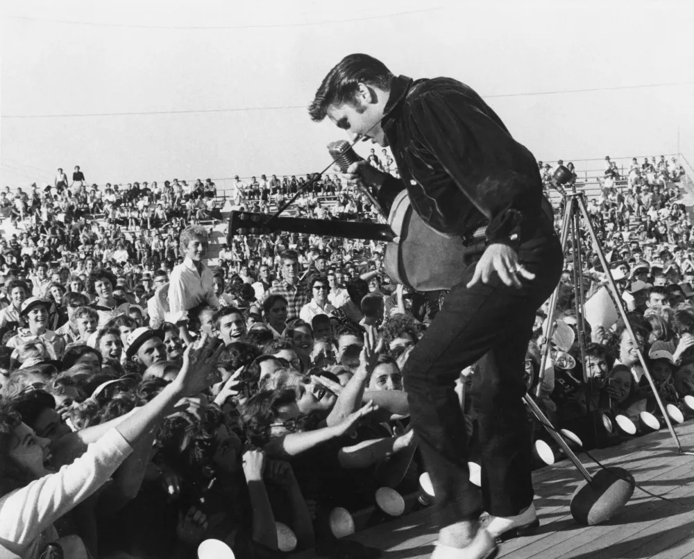 Elvis Presley performs, in this undated handout image. Elvis Presley Enterprises LLC/Handout via REUTERS THIS IMAGE HAS BEEN SUPPLIED BY A THIRD PARTY. NO RESALES. NO ARCHIVES. MANDATORY CREDIT. EDITORIAL USE FOR REPORTING ON "ELVIS EVOLUTION" ONLY. NO NEW USAGE AFTER 0001 GMT ON JANUARY 18, 2024.