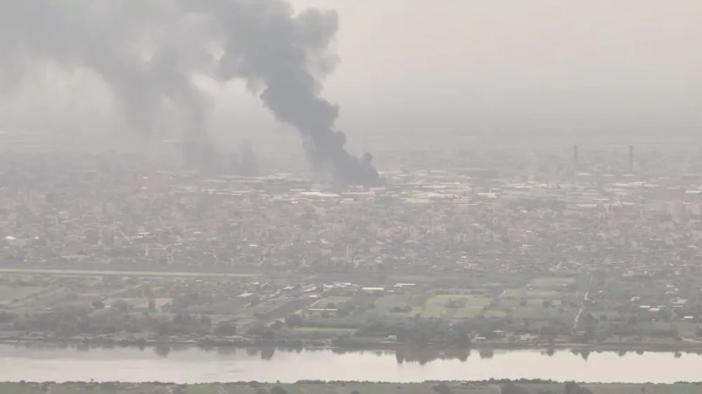 Plums of smoke rise amidst clashes between the paramilitary Rapid Support Forces and the army, in Bahri, Khartoum North (filmed from Omdurman), Sudan April 28, 2023, in this screen grab from a social media video. Video Obtained by REUTERS THIS IMAGE HAS BEEN SUPPLIED BY A THIRD PARTY.