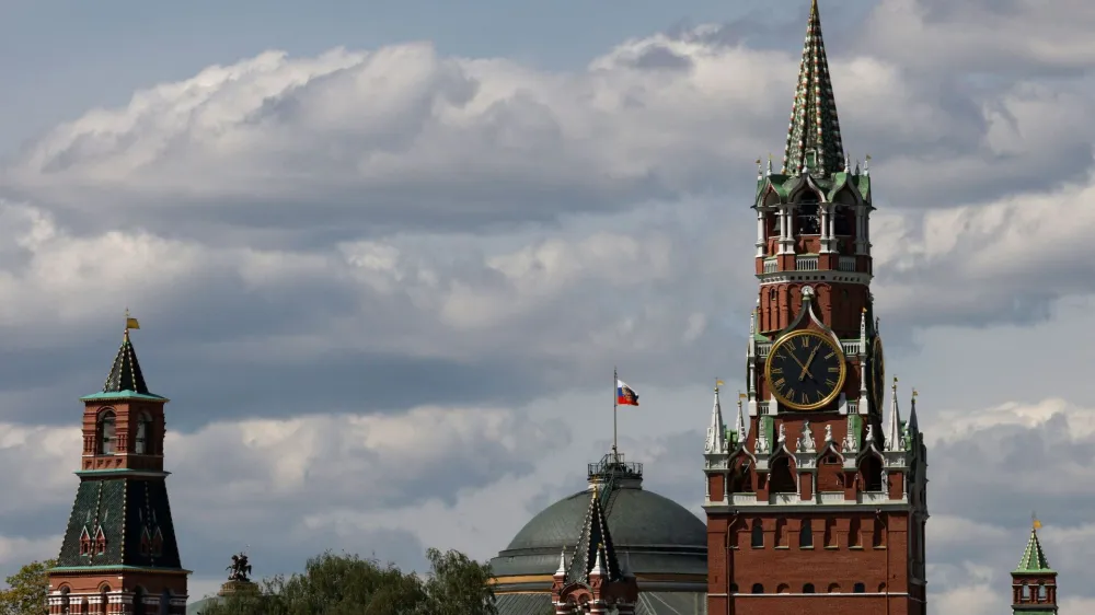 The Russian flag flies on the dome of the Kremlin Senate building behind Spasskaya Tower, in central Moscow, Russia, May 4, 2023. REUTERS/Stringer