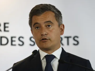 rench Interior Minister Gerald Darmanin speaks during a press conference Monday, May 30, 2022 in Paris. The British government says it's deeply concerned over the treatment of Liverpool supporters by French authorities, who blamed fans for unrest at the Champions League final amid overcrowding outside the Stade de France. (AP Photo/Jean-Francois Badias)