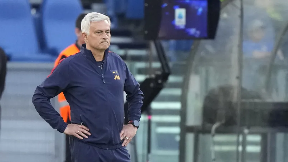 Roma's head coach Jose Mourinho follows the game during a Serie A soccer match between Roma and Inter Milan, at Rome's Olympic Stadium, Saturday, May 6, 2023. (AP Photo/Andrew Medichini)