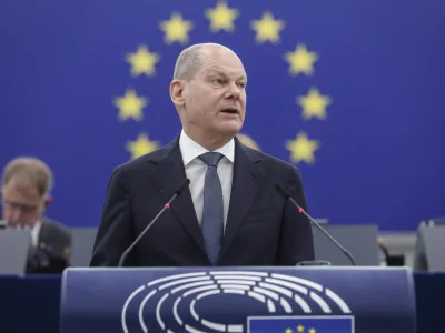 German Chancellor Olaf Scholz delivers his speech during a debate about Europe, Tuesday, may 9, 2023 at the European Parliament in Strasbourg, eastern France. (AP Photo/Jean-Francois Badias)