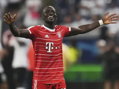 Bayern's Sadio Mane celebrates after the German Bundesliga soccer match between Eintracht Frankfurt and Bayern Munich in Frankfurt, Germany, Friday, Aug. 5, 2022. (AP Photo/Matthias Schrader)