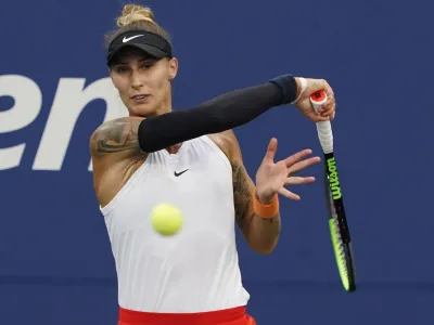 Polona Hercog, of Slovenia, strikes the ball during the first round of the US Open tennis championships, Tuesday, Aug. 31, 2021, in New York. (AP Photo/Elise Amendola)