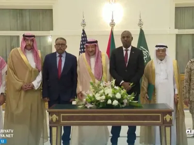 Officials stand for pictures after Sudan's army and rival paramilitary rapid support force signed a declaration, that signifies their commitment to protect the civilians of Sudan but not to a ceasefire, in Jeddah, Saudi Arabia, May 11, 2023. Al Ekhbariya/Handout via REUTERS  THIS IMAGE HAS BEEN SUPPLIED BY A THIRD PARTY. NO RESALES. NO ARCHIVES. MUST NOT OBSCURE LOGO.