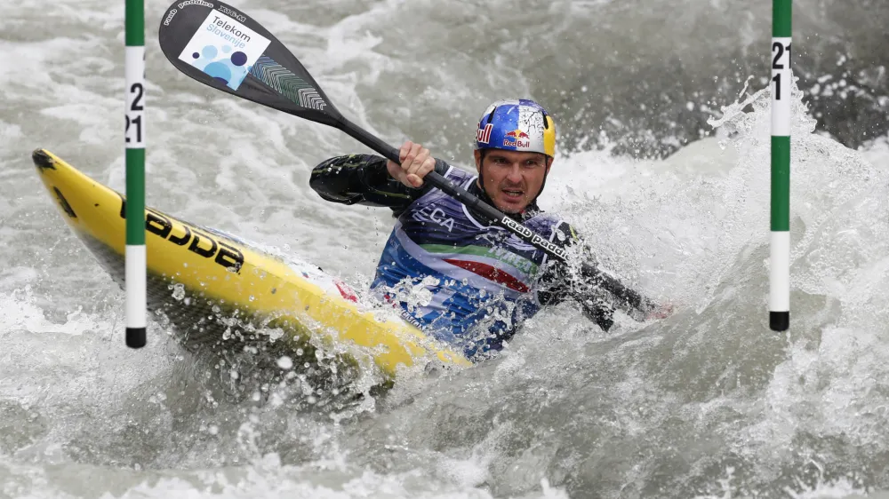 ﻿Canoeing - 2021 ECA Canoe Slalom European Championships, Ivrea, Italy - May 8, 2021 Slovenia's Peter Kauzer in action during the Men's Kayak (K1) final REUTERS/Alessandro Garofalo