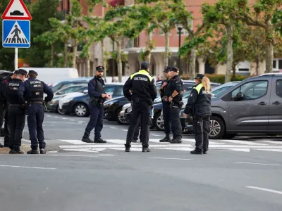 Police cordon off the area where a man and a woman died in a suspected bomb blast related to gender violence, according to the Basque regional security department, in Orio, northern Spain, May 16, 2023. REUTERS/Vincent West