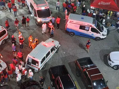 20 May 2023, El Salvador, San Salvador: Ambulances stand outside Cuscatlan Stadium after a stampede during the soccer match between FC Alianza and CD FAS in El Salvador. At least nine people died and some 100 were injured. Photo: -/La Nacion via ZUMA Press/dpa