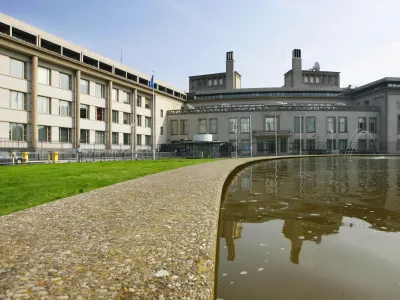 Exterior of the U.N. war crimes tribunal for former Yugoslavia in The Hague, Netherlands, Wednesday, July 30, 2008. The court has announced that former Bosnian Serb leader Radovan Karadzic will be summoned before a judge Thursday afternoon and asked to enter a plea on each of 11 counts, including genocide, extermination and persecution. (AP Photo/ Cris Toala Olivares)