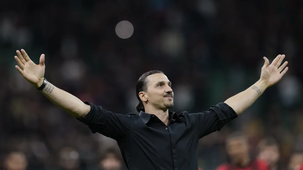 AC Milan's Zlatan Ibrahimovic reacts after his last game for the club at the end of a Serie A soccer match between AC Milan and Hellas Verona at the San Siro stadium, in Milan, Italy, Sunday, June 4, 2023. (AP Photo/Antonio Calanni)