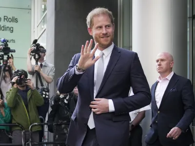 Prince Harry leaves the High Court after giving evidence in London, Wednesday, June 7, 2023. Prince Harry has given evidence from the witness box and has sworn to tell the truth in testimony against a tabloid publisher he accuses of phone hacking and other unlawful snooping. He alleges that journalists at the Daily Mirror and its sister papers used unlawful techniques on an "industrial scale" to get scoops. Publisher Mirror Group Newspapers is contesting the claims. (AP Photo/Kin Cheung)