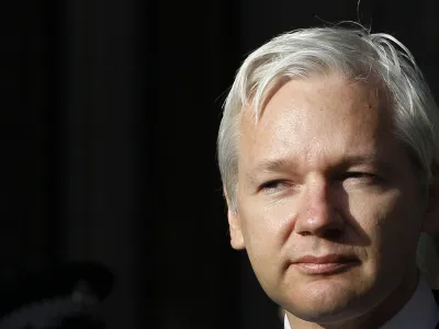 FILE - WikiLeaks founder Julian Assange pauses as he makes a statement to media gathered outside the High Court in London, on Dec. 5, 2011. Australia's Prime Minister Anthony Albanese said Wednesday, Nov. 30, 2022, he recently told U.S. President Joe Biden's administration to bring WikiLeaks founder and Australian citizen Julian Assange's prosecution to a close. (AP Photo/Kirsty Wigglesworth, File)