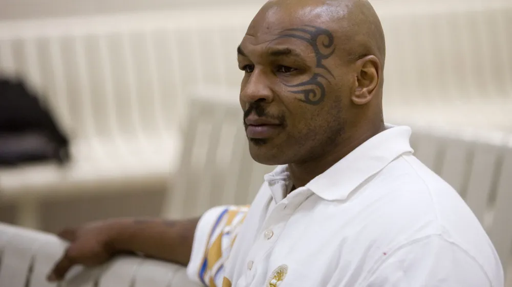 Boxer Mike Tyson is shown at his initial appearance hearing in the Maricopa County Jail in Phoenix, Ariz., Friday morning, Dec. 29, 2006. Tyson was arrested early Friday on suspicion of driving under the influence and possession of cocaine after police stopped him shortly after he left a Scottsdale nightclub.  (AP Photo/Jack Kurtz, Pool)