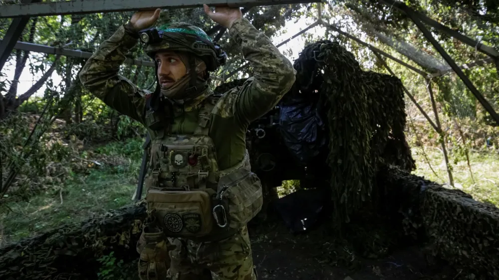 A Ukrainian service member is seen on his position at a front line, amid Russia's attack on Ukraine, in Donetsk region, Ukraine June 18, 2023. REUTERS/Anna Kudriavtseva