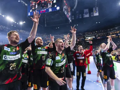 Magdeburg's players celebrate winning the Final Four Champions League handball final match against KS Kielce at Lanxess Arena in Cologne, Germany, Sunday June 18, 2023. (Marius Becker/dpa via AP)