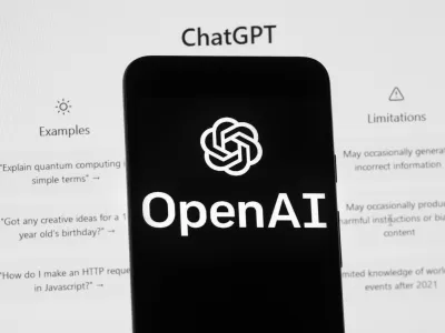 FILE - The OpenAI logo is seen on a mobile phone in front of a computer screen displaying the ChatGPT home screen, March 17, 2023, in Boston. Chinese police said they recently detained a ChatGPT user for allegedly using the AI-powered chatbot to create a fake news story about a nonexistent train crash. (AP Photo/Michael Dwyer, File)