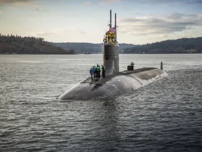 FILE - In this Dec. 15, 2016, photo provided by the U.S. Navy, the Seawolf-class fast-attack submarine USS Connecticut (SSN 22) departs Puget Sound Naval Shipyard in Bremerton, Wash., for sea trials following a maintenance availability. The vessel that went missing Sunday, June 18, 2023, in the North Atlantic while exploring the Titanic is not a submarine, it's a submersible. The National Oceanic and Atmospheric Administration says a submarine has enough power to leave port and come back to port under its own power while a submersible is not autonomous. (Thiep Van Nguyen II/U.S. Navy via AP, File)