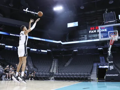 Jun 24, 2023; San Antonio, TX, USA; San Antonio Spurs draft pick Victor Wembanyama shoots around at a press conference at AT&T Center. Mandatory Credit: Troy Taormina-USA TODAY Sports