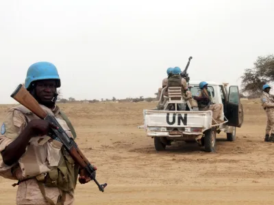 FILE PHOTO: UN peacekeepers stand guard in the northern town of Kouroume, Mali, May 13, 2015. Kourome is 18 km (11 miles) south of Timbuktu. REUTERS/Adama Diarra/File Photo