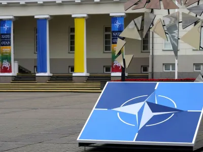 A NATO sign is seen next to the Presidential Palace in Vilnius, Lithuania July 10, 2023. REUTERS/Ints Kalnins